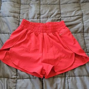 Red running shorts with liner, medium